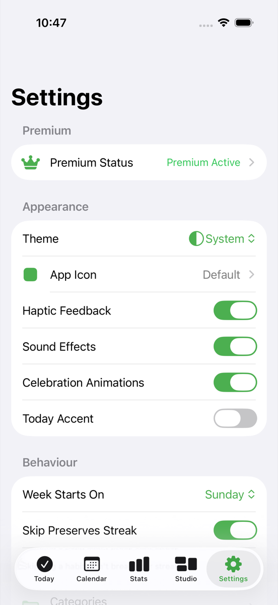 Habit Studio settings screen with premium, appearance, and behavior controls.